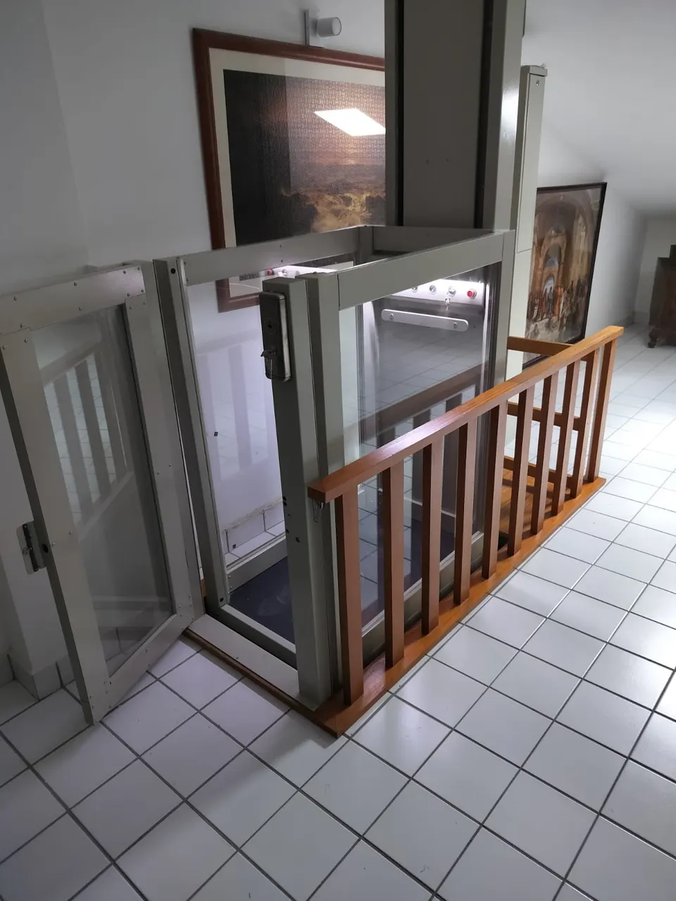 OnLevel PV30 platform lift with timber gate in a bright hallway